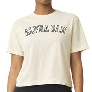 Alpha Gamma Delta woman wearing an officially licensed Comfort Colors boxy crop t-shirt featuring the AGD sorority nickname design