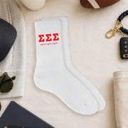 Sigma Sigma Sigma crew socks styled in a sorority flat lay with Greek life accessories and campus-inspired décor