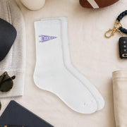 Sigma Sigma Sigma collegiate pennant crew socks styled in a sorority flat lay with Greek life accessories