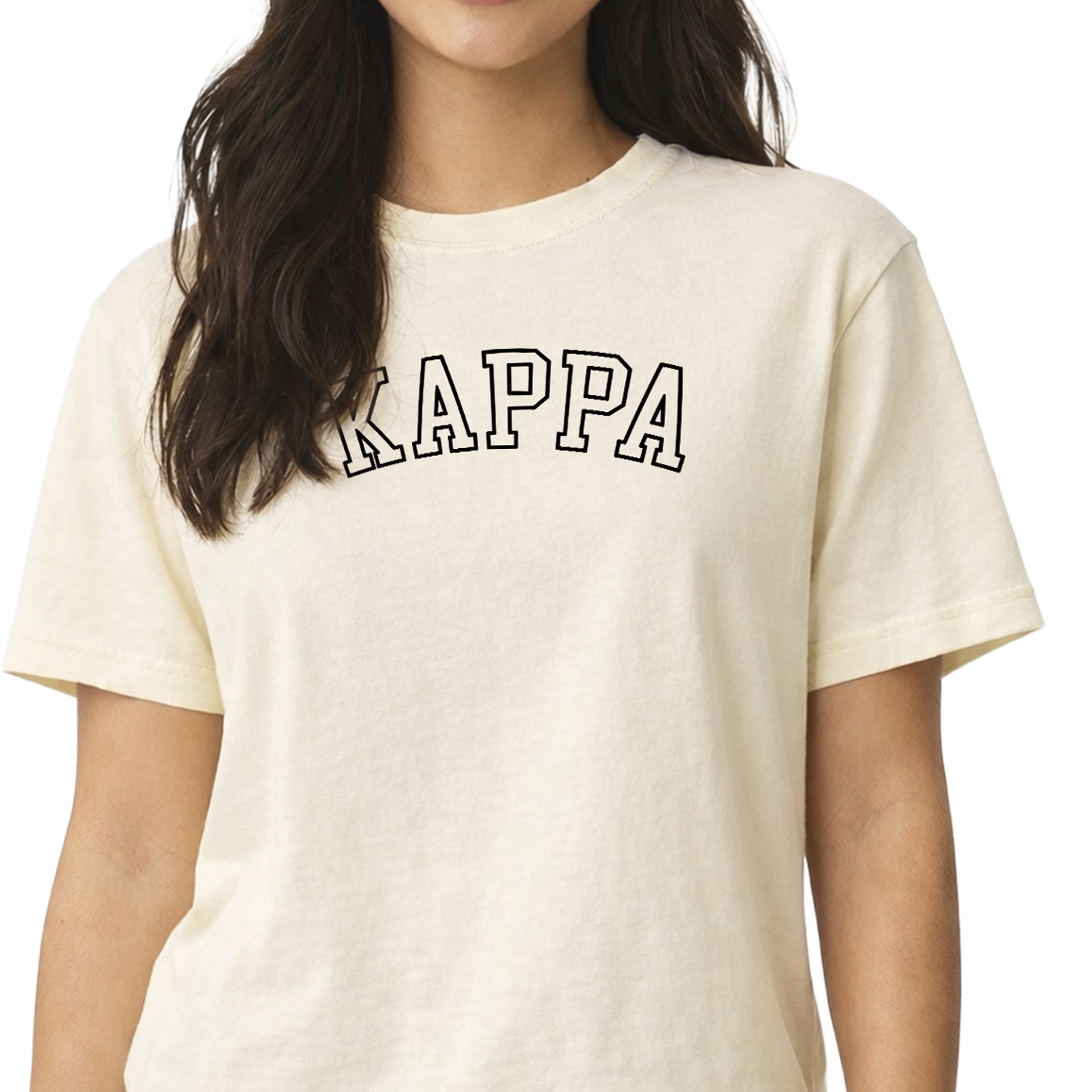 Kappa Kappa Gamma woman wearing an officially licensed Comfort Colors boxy crop t-shirt featuring the Kappa sorority nickname design