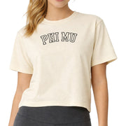 Phi Mu woman wearing an officially licensed Comfort Colors boxy crop t-shirt featuring the Phi Mu sorority nickname design