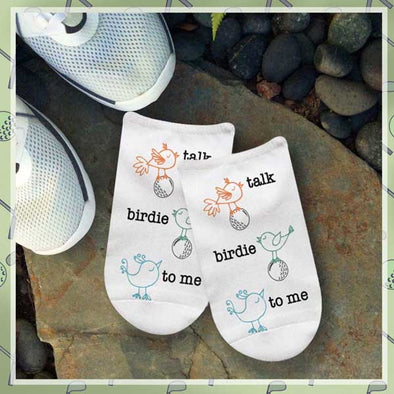 Fun printed golf no show socks with a "talk birdie to me" design that can be seen on the top of the foot when worn