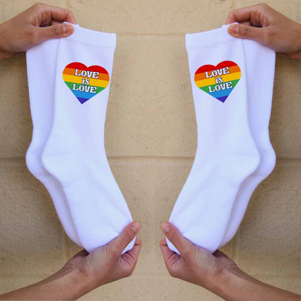 Love is love rainbow pride heart design custom printed on comfy white cotton crew socks is perfect for pride parade.