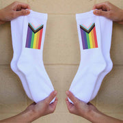 Comfortable and soft white cotton crew socks are the perfect accessory for your pride celebrations with these custom printed progress pride flag on cotton crew socks.