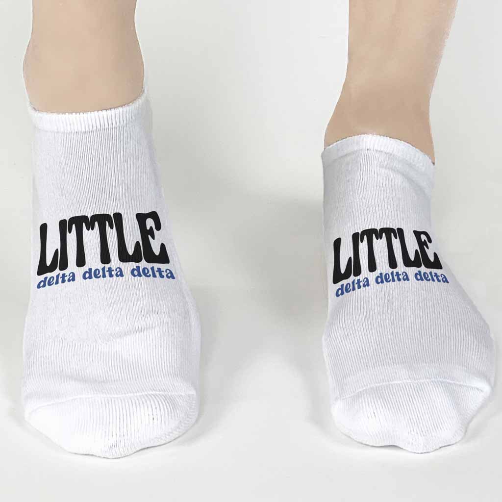 Fun Delta Delta Delta big and little design custom printed on the top of comfy white cotton no show socks.