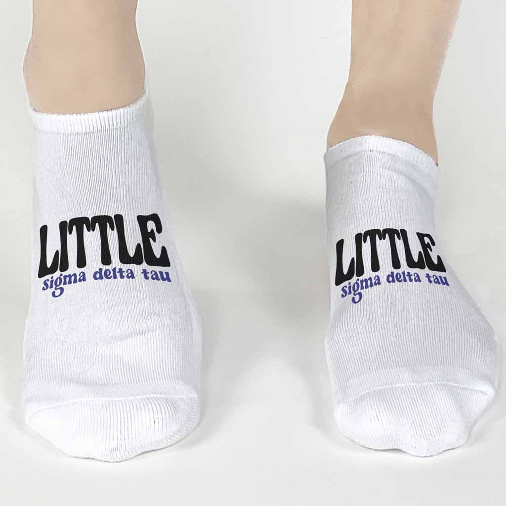 Custom printed Sigma Delta Tau Big and Little designs on white cotton no show socks.