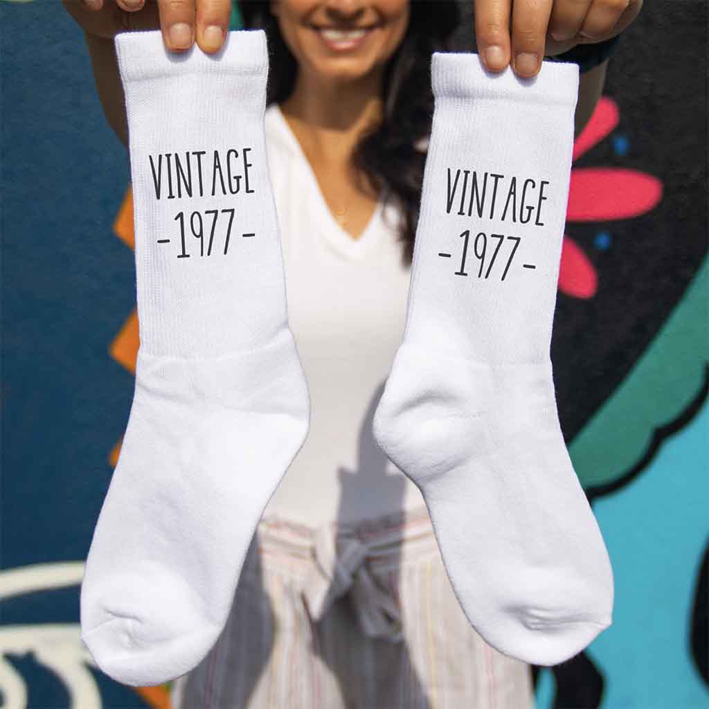 White cotton crew socks custom printed with a cool vintage design and your birthday year and a gift box included.