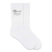 These cotton socks printed with officiant wedding party role and fun saying what I say goes on the side of the socks make a practical gift for your wedding party.