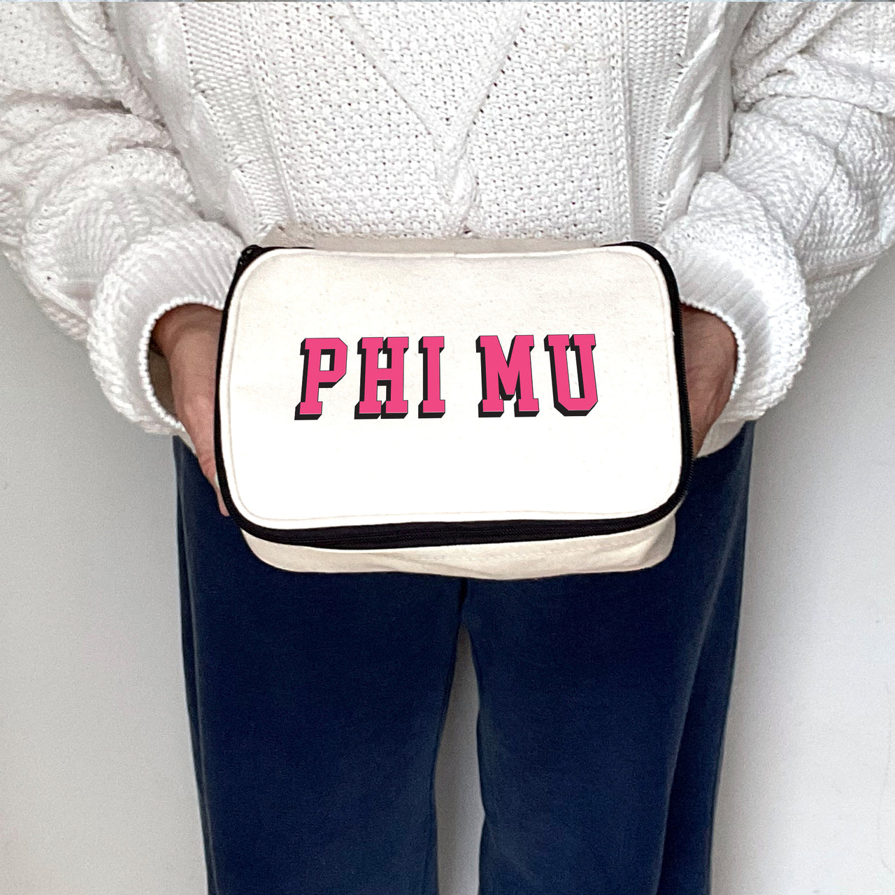 Angled view of Phi Mu 3D Print Sorority Name Cosmetic Make Up Bag showcasing 3D lettering