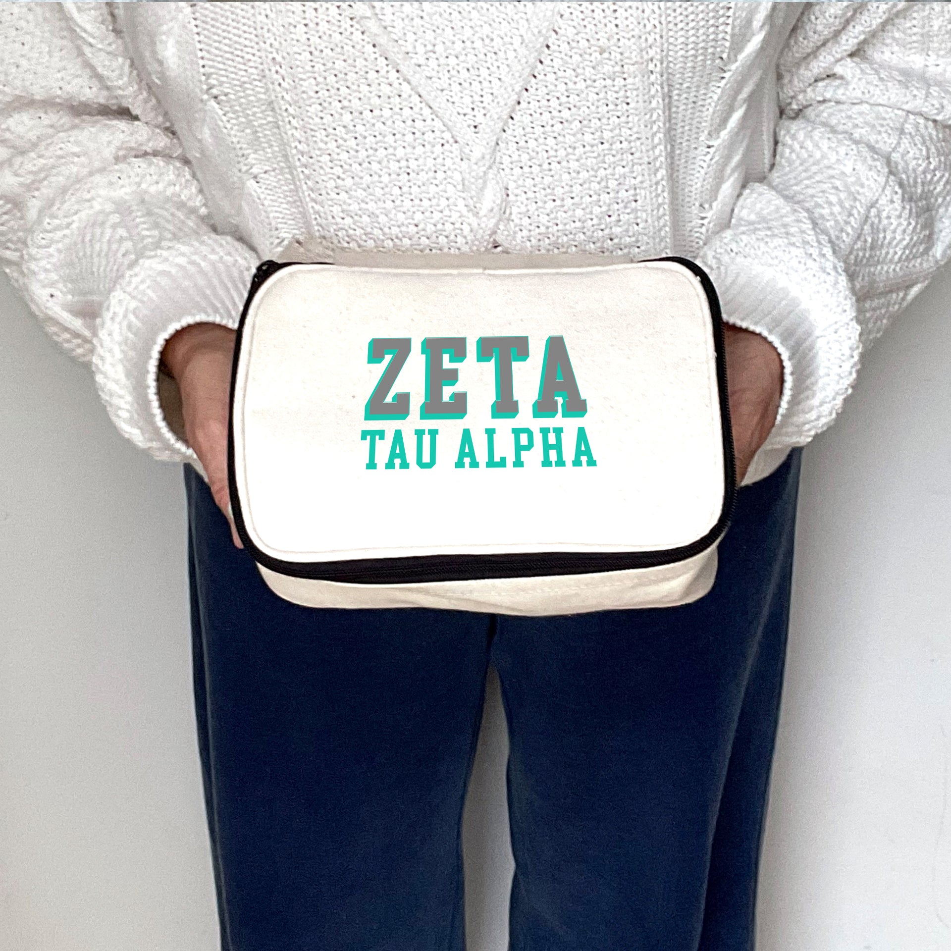 Angled view of Zeta Tau Alpha 3D Print Sorority Name Cosmetic Make Up Bag showcasing 3D lettering