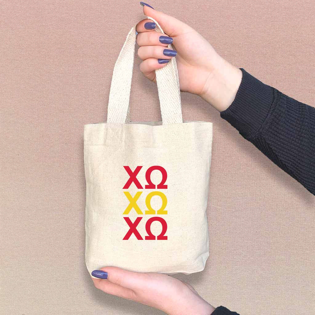 Chi Omega sorority letters in sorority colors digitally printed on the perfect mini size natural canvas tote bag.