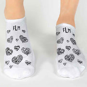 Fun animal print heart design custom printed on no show socks and personalized with your monogram in a 3 pair gift box set.