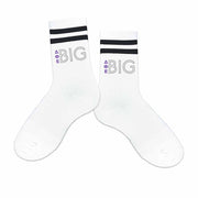 Comfy black striped crew socks digitally printed with Delta Phi Epsilon Greek letters and Big or Little design.