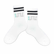 The perfect gift for your sorority sister are these big or little ZTA printed crew socks with black stripes.
