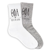 Theta Phi Alpha boho sorority letters and name on white and gray crew socks