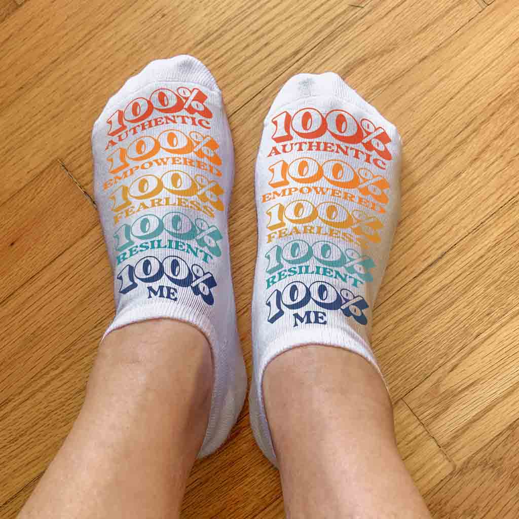 Full print self positivity design by sockprints digitally printed on no show socks.