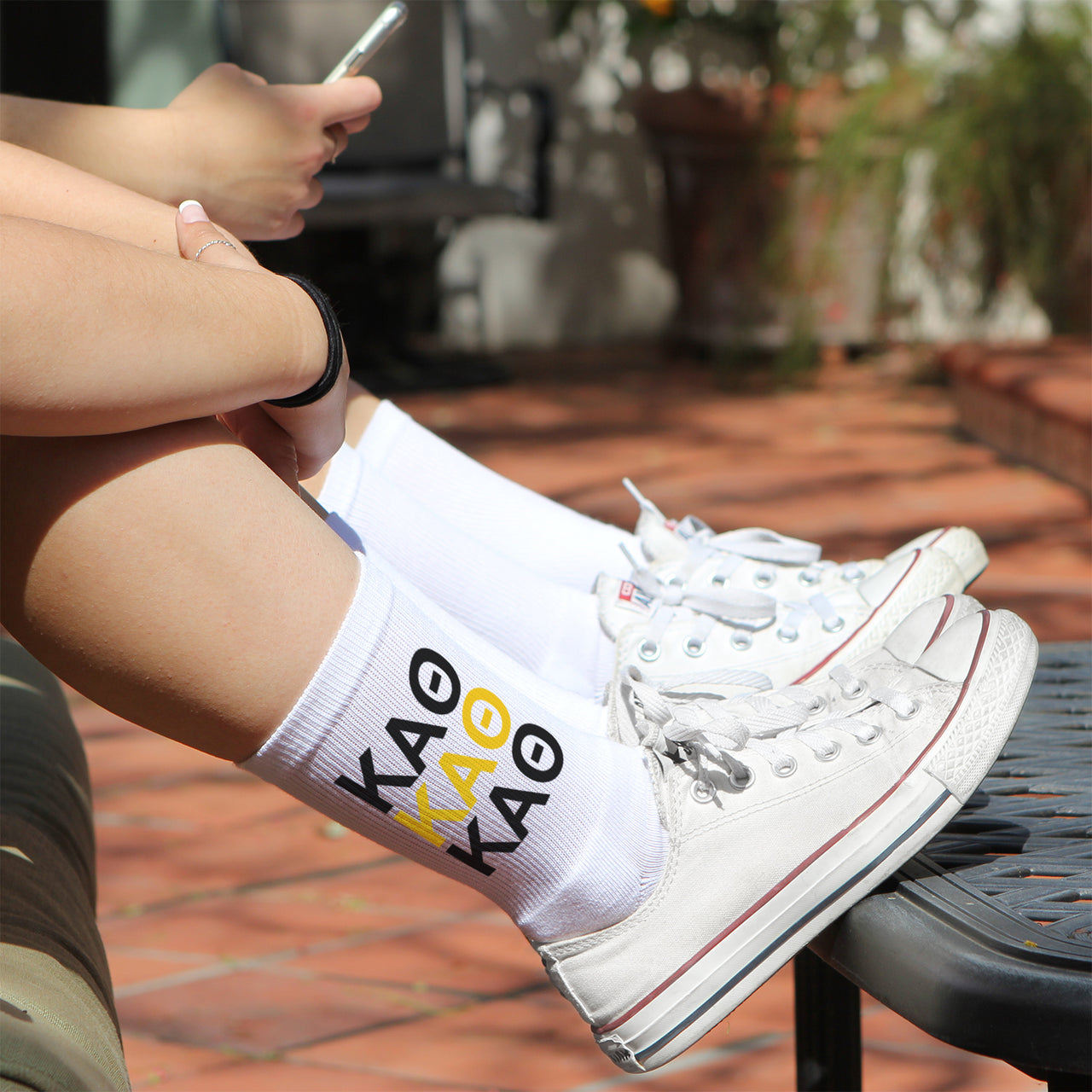 Kappa Alpha Theta sorority letters repeating design custom printed on white cotton crew socks