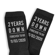 Celebrate a two year anniversary with personalized cotton socks for him digitally printed in black ink on the sides of the ribbed crew socks.