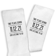 Two years down our lifetime to go personalized with your wedding date digitally printed on cotton socks.
