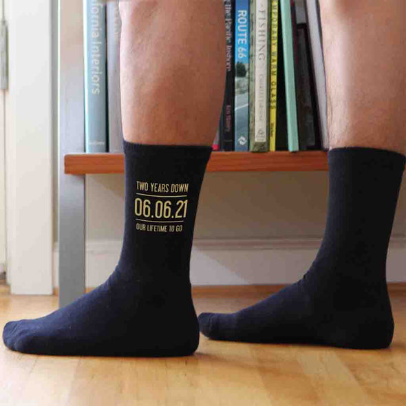 Two years down our lifetime to go digitally printed in gold ink personalized with your wedding date on cotton socks.
