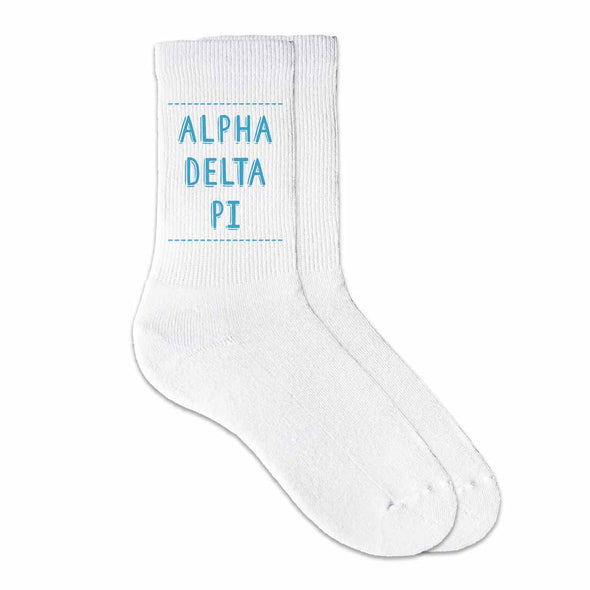 Soft white cotton crew socks custom printed with Alpha Delta Pi name in sorority color is the perfect accessory for your sorority event.