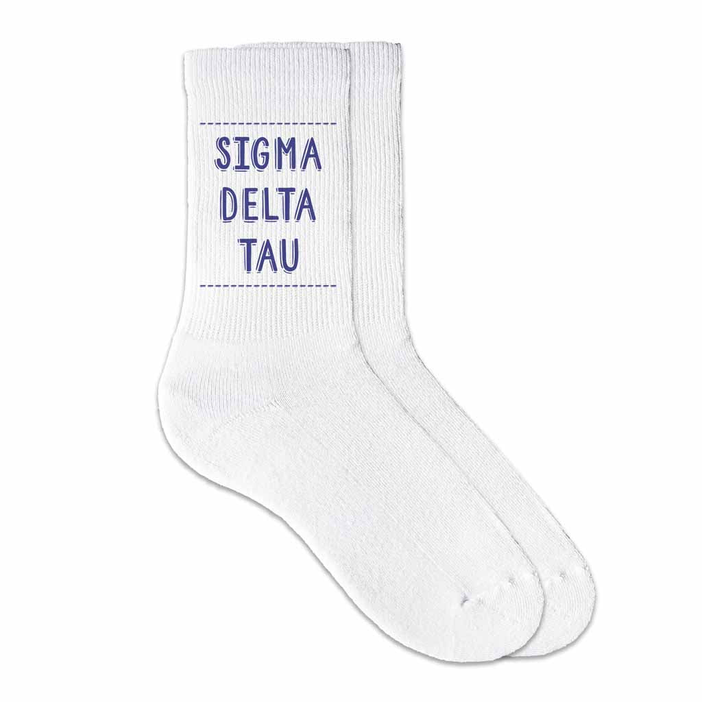 Sigma Delta Tau sorority crew socks digitally printed in sorority color on soft white cotton crew socks make the perfect gift for your sorority sisters.
