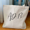 AD Pi sorority nickname digitally printed in script writing on canvas tote bag makes the perfect accessory for the college year.