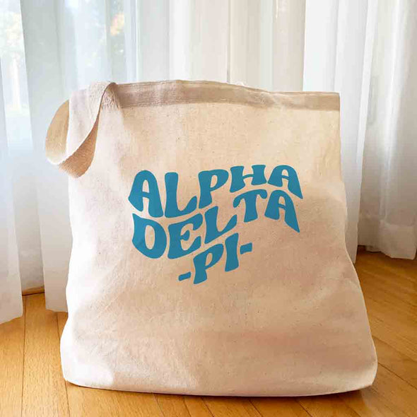Alpha Delta Pi sorority name digitally printed on roomy canvas tote bag.