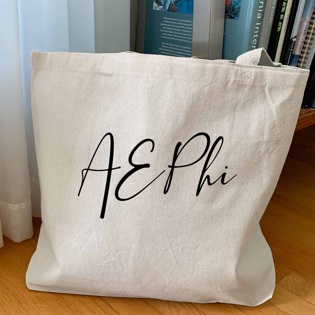 Alpha Epsilon Phi sorority nickname custom printed in script writing on canvas tote bag is a unique gift for all your sorority sisters.