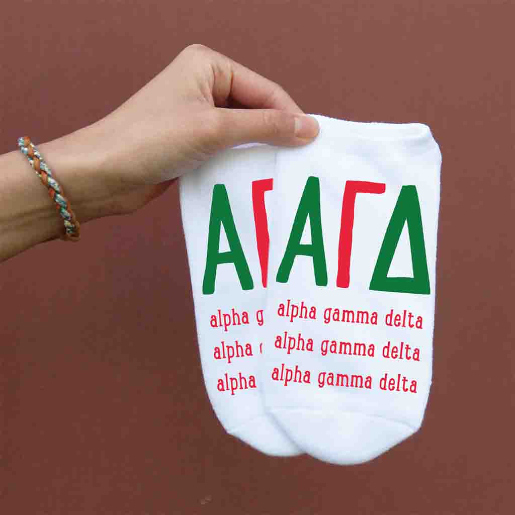 Alpha Gamma Delta sorority name and letters digitally printed on white no show socks.