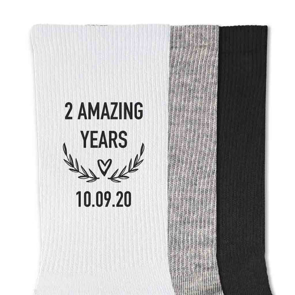 Two amazing years custom printed on the sides of ribbed crew socks with your wedding date.