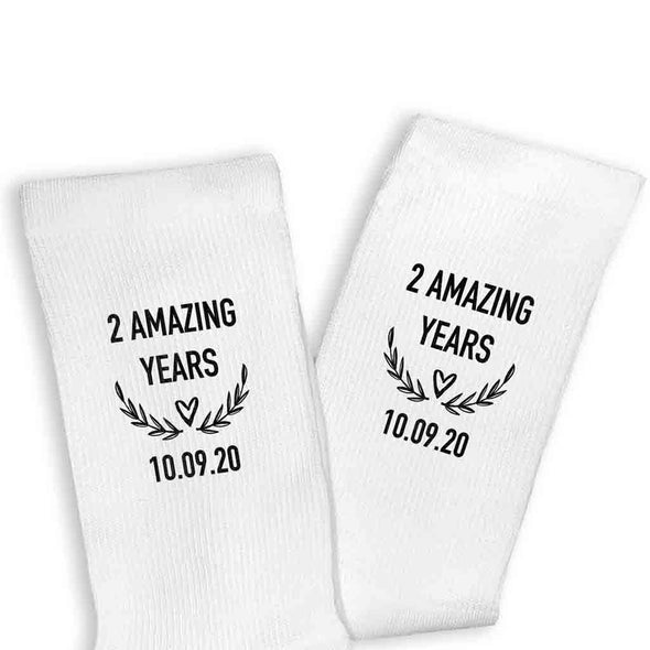 Two amazing years custom printed on the sides of ribbed crew socks with your wedding date.