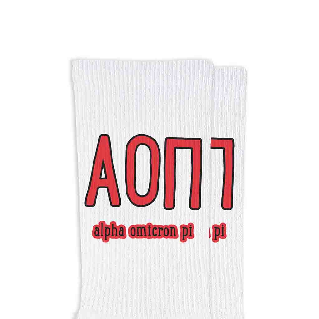 Alpha Omicron Pi sorority name and letters digitally printed on white crew socks.