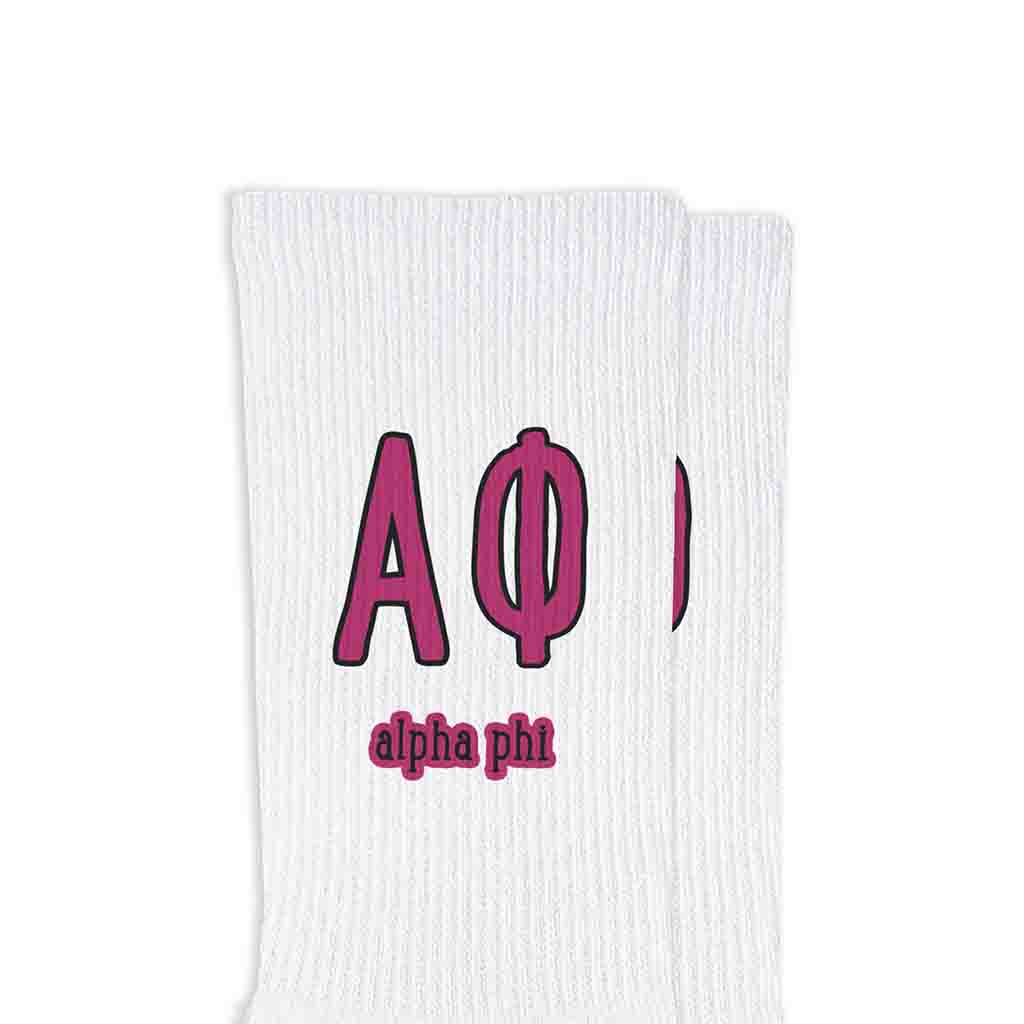 Alpha Phi sorority letters and name in sorority colors digitally printed on white crew socks.