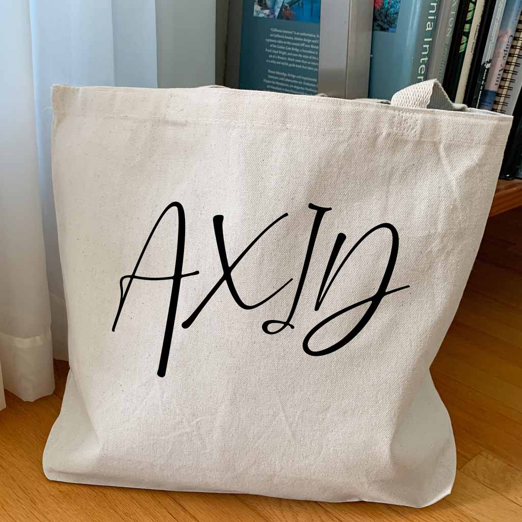 AXID sorority nickname custom printed in script writing on canvas tote bag is a unique gift for all your sorority sisters.