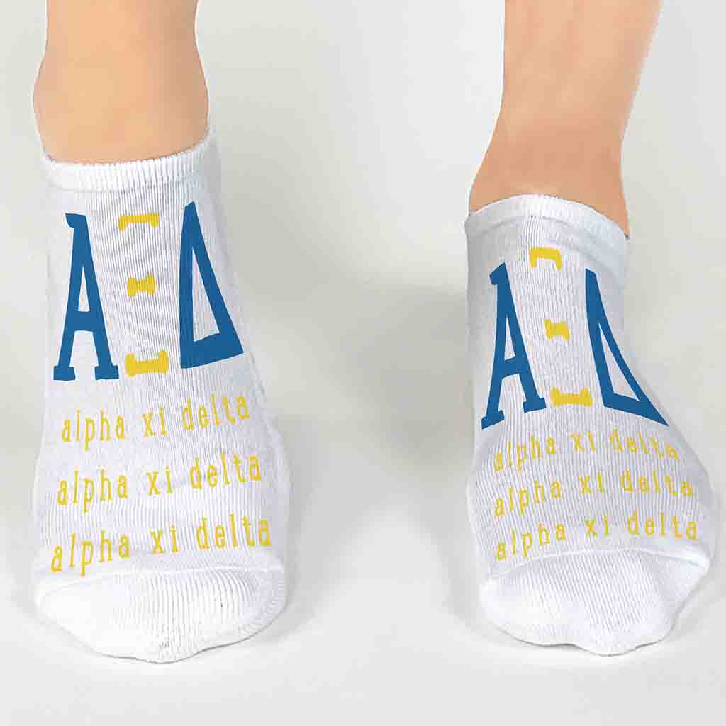 Alpha Xi Delta sorority name and letters digitally printed in sorority colors on white no show socks.