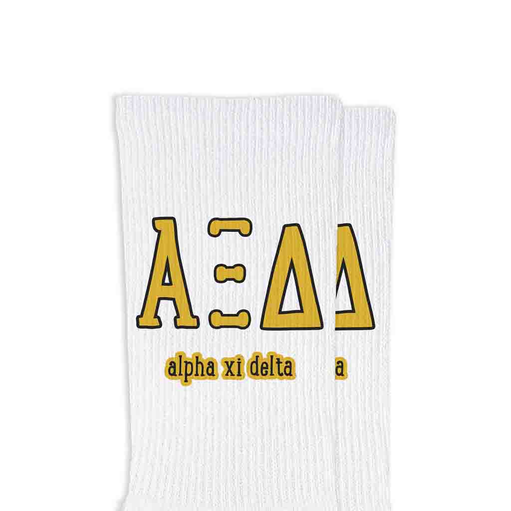 Alpha Xi Delta sorority letters and name digitally printed on white crew socks.