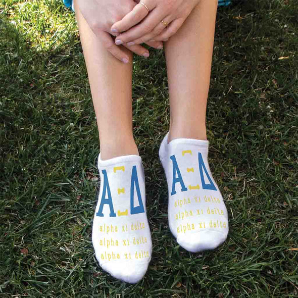 Alpha Xi Delta sorority name and letters digitally printed in sorority colors on white no show socks.