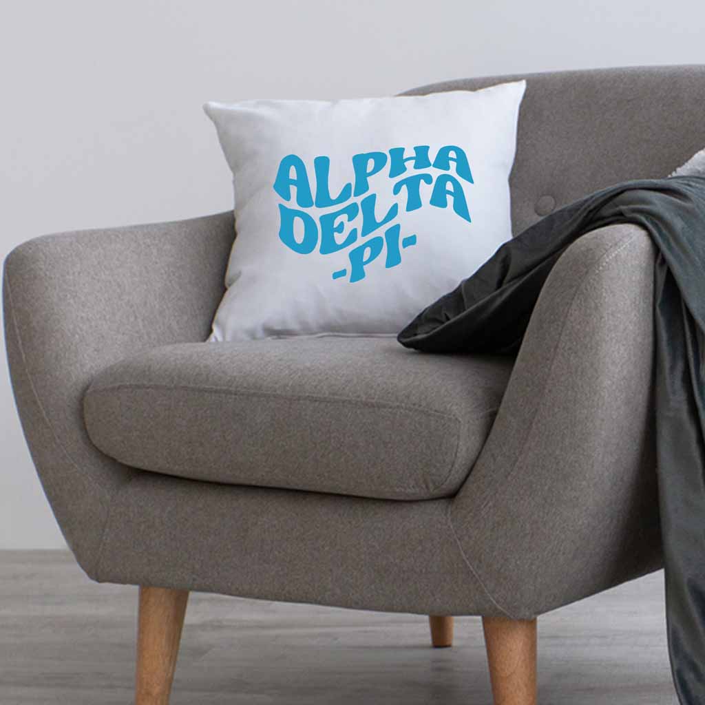 Alpha Delta Pi sorority name digitally printed in sorority color mod style design on a throw pillow cover.