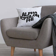 Alpha Epsilon Phi sorority name digitally printed in black ink mod style design on a throw pillow cover.