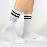 Black striped crew socks custom design by sockprints with Little and your sorority letters digitally printed on the outside of both socks.