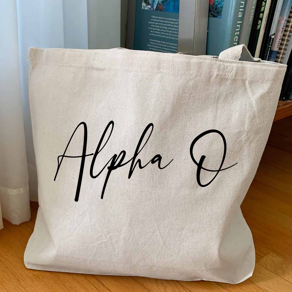 Alpha O sorority nickname custom printed in script writing on canvas tote bag is a unique gift for all your sorority sisters.