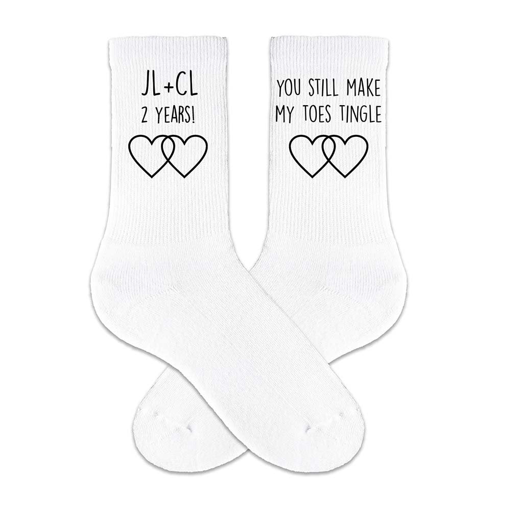 You still make my toes tingle custom printed on the sides of cotton crew socks available in white, pink, black, or heather gray.