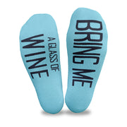 Bring me a glass of wine custom printed in black ink on the bottom soles of turquoise no show socks make a fun way to get what you want.