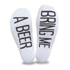Bring me a beer digitally printed in black ink on the soles of white cotton no show socks makes a great gift for your spouse.