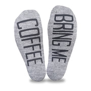 Bring me coffee custom printed in black ink on the bottom of heather gray no show socks make a great gift idea for the coffee lover.