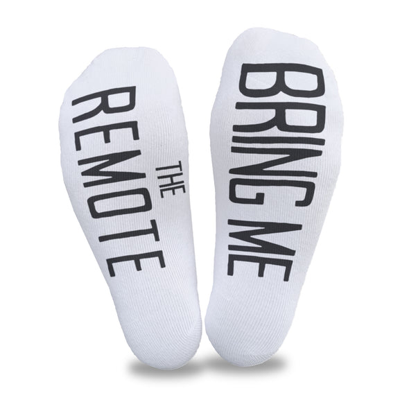 Bring me the remote digitally printed on the bottom of white cotton no show socks is a fun way to get our kids to bring you the remote.