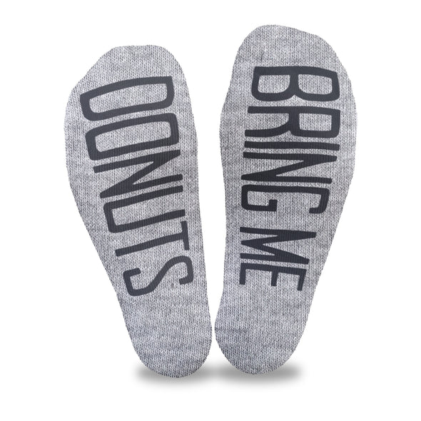 Bring me donuts custom printed in black ink on the soles of heather gray no show socks is a great way to get a sweet treat.