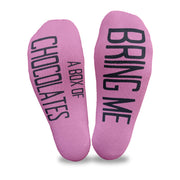 Bring me a box of chocolates custom printed in black ink on the bottom soles of fuchsia no show socks is a great way to get what you want.