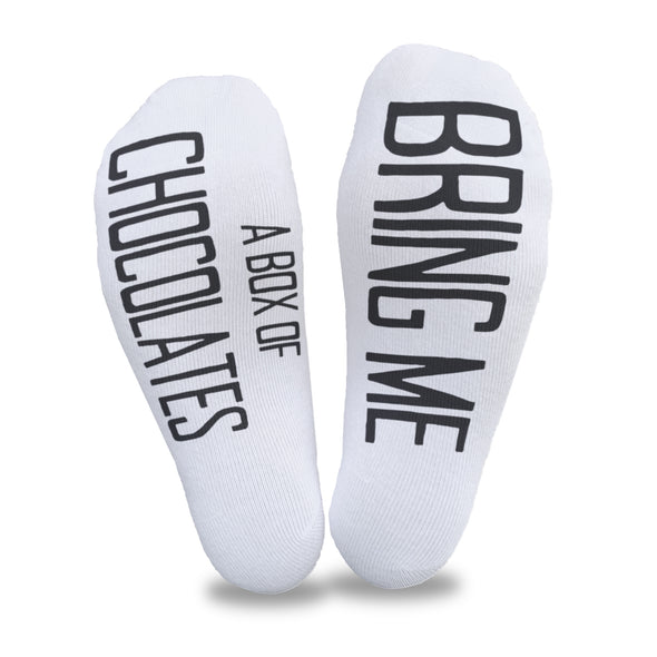 Bring me a box of chocolates custom printed in black ink on the bottom soles of white cotton no show footie socks is a subtle way to ask for chocolate.